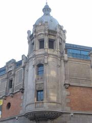 Exterior view of Alhóndiga de Bilbao building with modern architectural design and glass facade