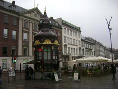 Classic red telephone kiosk on Nytorv Square in Copenhagen, Denmark