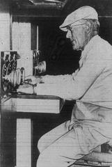 Dan Brady operating the scoreboard at Wrigley Field in Los Angeles, California, 1942