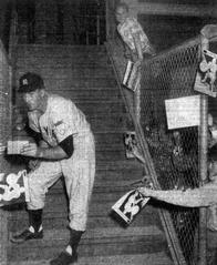 New York Yankees pitcher Bob Porterfield signing autographs during 1951 spring training at Wrigley Field Los Angeles