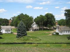 Augustana College Heritage Park in Sioux Falls South Dakota with green lawns and decorative landscaping