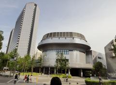 Front view of Matsushita IMP Building with modern architectural design