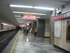 Metro Insurgentes tracks in Mexico City with columns decorated with pre-Hispanic motifs
