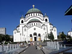 Slovenians admiring the unfinished Church of Saint Sava at the water fountain in Vračar