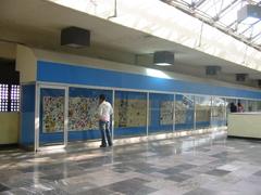 Exhibition space at Metro Chabacano station in Mexico City with colorful art and display panels
