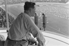 Martti Jukola commentating a sports event at Helsinki Olympic Stadium in the 1930s