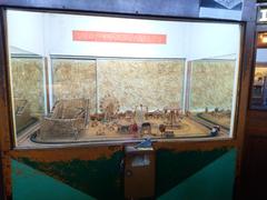 Model train running through a landscape made of matchsticks at Musée Mécanique in San Francisco