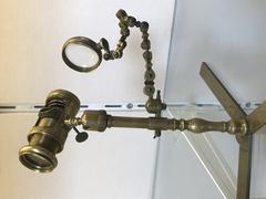 Edmund Culpeper simple microscope illustrated with wooden stand and lenses