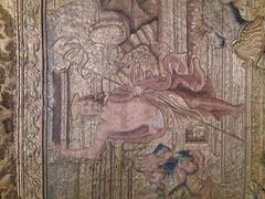 Detail of Resurrection of Christ on dalmatic vestment from late 16th-early 17th century Spain with golden silk embroidery and lamé satin fabric