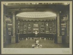 Interior view of Rotunda No.1 at Galerie Vasnier showing artworks and busts under a glass ceiling
