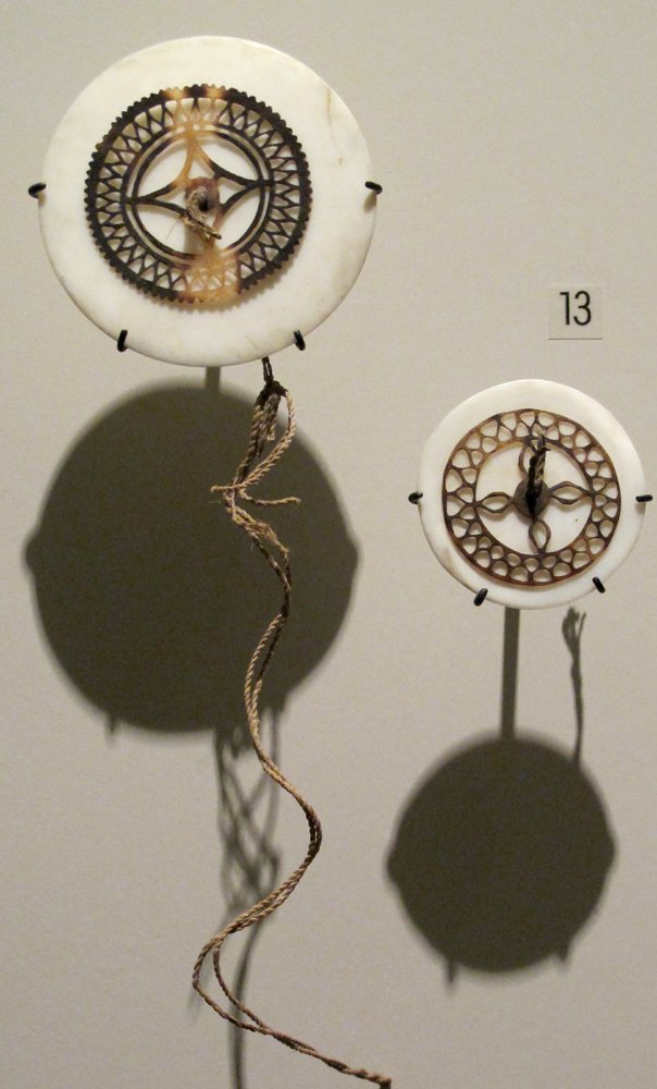 Traditional Kapkap forehead ornaments made from tridacna shell and tortoiseshell, from the Admiralty Islands, Papua New Guinea