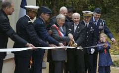 Ribbon cutting ceremony at Lafayette Escadrille Memorial Cemetery visitor center in Marnes-la-Coquette, France on Nov 11, 2019