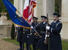 United States Air Forces in Europe honor guard presenting colors during Veterans Day ceremony at Lafayette Escadrille Memorial Cemetery