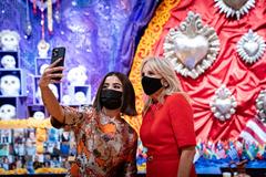 First Lady Jill Biden talking with social media personality Barbara Camila at the National Museum of Mexican Art in Chicago, October 12, 2021