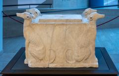 Marble container with detailed sculptures of dogs at Campidoglio Museum