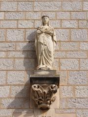 Statue of the Virgin Mary on the façade of Lérins Abbey Church