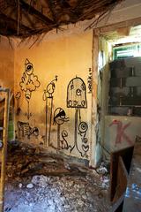Wall paintings in typing room at Abbey of Thelema in Cefalù, Sicily