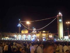 Abu Hanifa Mosque exterior with white walls and arched windows