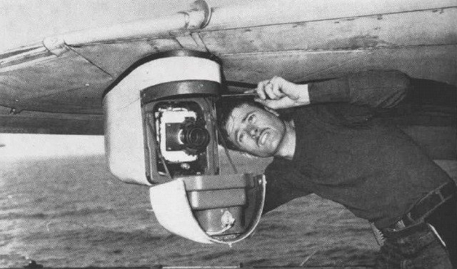 Strike camera mounted beneath wing of Douglas A-4 Skyhawk aircraft aboard USS Coral Sea aircraft carrier