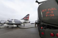 U.S. Air Force Airman fueling a Top Aces A-4 Skyhawk aircraft at Spangdahlem Air Base