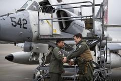 Top Aces fighter pilot with USAF F-16 pilot at Spangdahlem Air Base next to A-4 Skyhawk