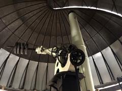 Interior of the Equatorial Room at Cincinnati Observatory showing mounted equatorial telescope