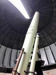 Equatorial Room interior of Cincinnati Observatory with large telescope and arched ceiling