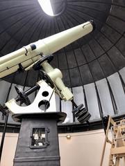 Interior view of the Equatorial Room at the Cincinnati Observatory in Hyde Park, Cincinnati, Ohio with telescope and detailed dome ceiling