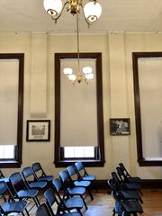 Lecture Hall interior with rows of wooden seats at Cincinnati Observatory in Hyde Park, Cincinnati, Ohio