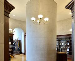 Interior of the library at Cincinnati Observatory in Hyde Park, Cincinnati, Ohio with wooden shelves and books