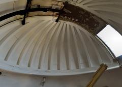 Interior of King's Observatory dome in Kew with scientific instruments and celestial maps