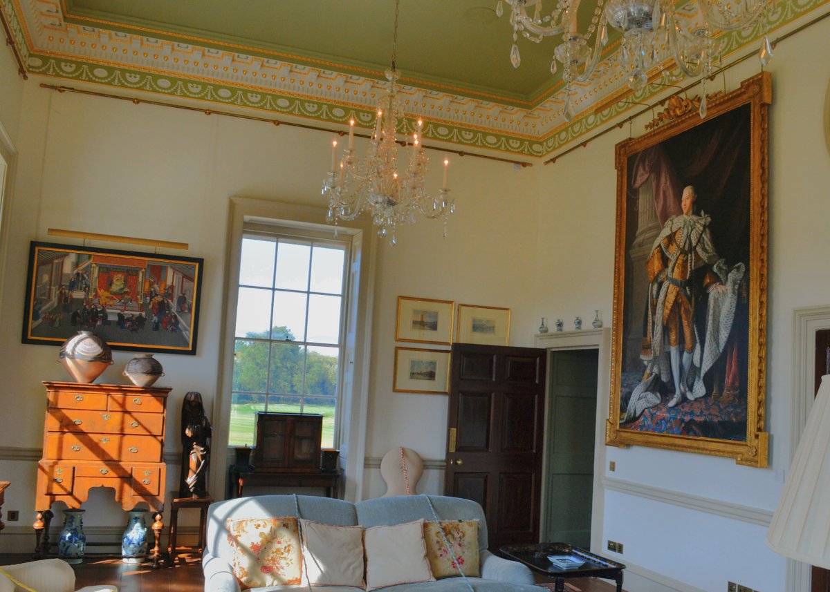 Lounge interior of King's Observatory in Kew featuring a portrait of King George III