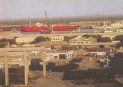 Chittagong port in 1960 with ships and cranes