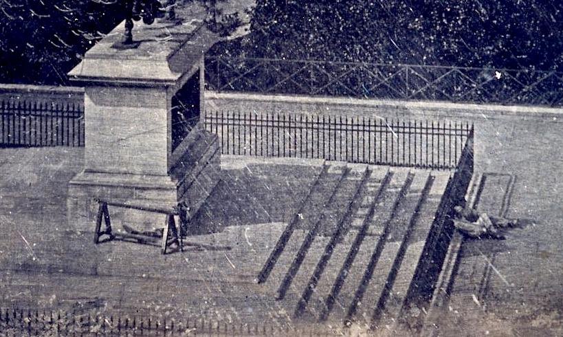 Pont Neuf in Paris photographed between 1836 and 1839 by Louis Daguerre and Mathurin Joseph Fordos, showing workers resting in the shade of the statue