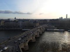 View of Pont Neuf in Paris with Seine River and surrounding cityscape