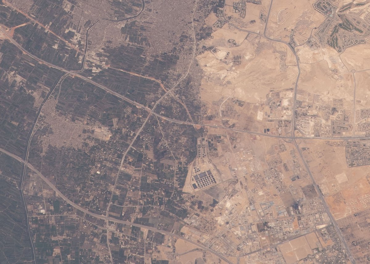 Aerial view of Egypt showing Abu Rawash Wastewater Treatment Plant, El Hassana Desert Dome, Kafr Hakim agricultural land, and surrounding areas of Kirdasah and Nahia in Giza