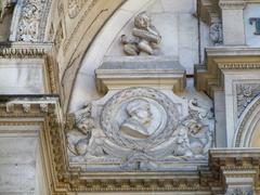 Close-up detail of the facade of the Theatre of Avignon, showcasing classical architectural elements