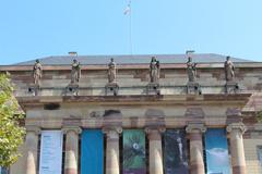 Exterior view of Opéra de Strasbourg building with classical architectural details under a clear blue sky