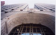 Looking up at the Penobscot Building's elegant doorway archway with detailed architecture