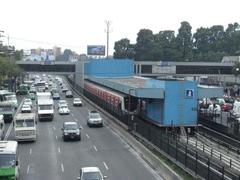 Entrance to Metro General Anaya Station with people walking around