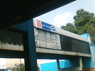 Nativitas metro station entrance with signage and commuters