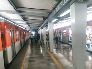 Exterior view of Portales metro station entrance in Mexico City