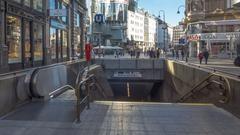 U-Bahn station Stephansplatz in Vienna with escalators and people