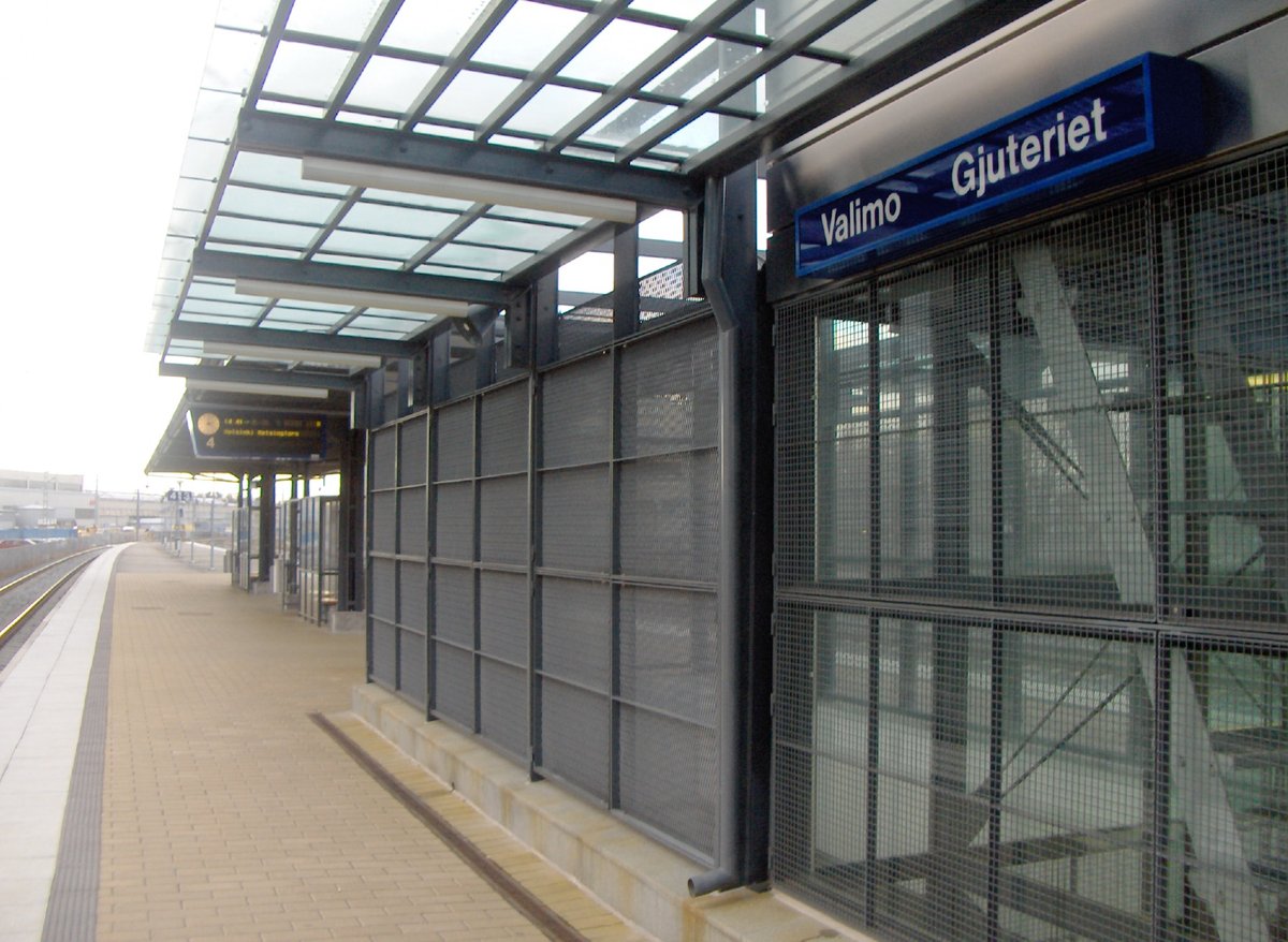 Valimo railway station in Helsinki, Finland with train tracks and platform