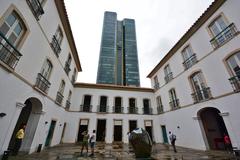 Paço Imperial in Rio de Janeiro, historic colonial building with arches and palm trees