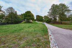 Sinebrychoffin puisto park in Helsinki during early autumn with trees and green grass