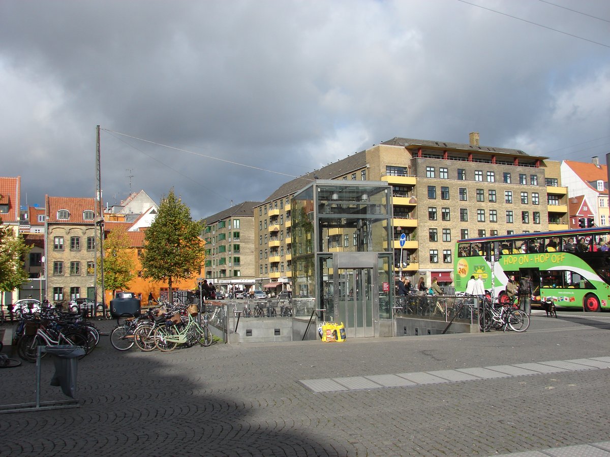Christianshavns Torv square in Christianshavn, Copenhagen with historic buildings and cobblestone street