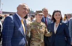 President of Albania Ilir Meta, 1-131st Aviation Regiment pilot 2nd Lt. Valdeta Mehanja, and U.S. Ambassador Yuri Kim at military event in Tirana, May 23, 2021