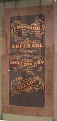 Historical banner advocating manhood suffrage and voting by ballot from 1866