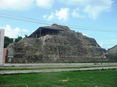 Archaeological ruins of Acanceh in Yucatán with stone structures and clear sky